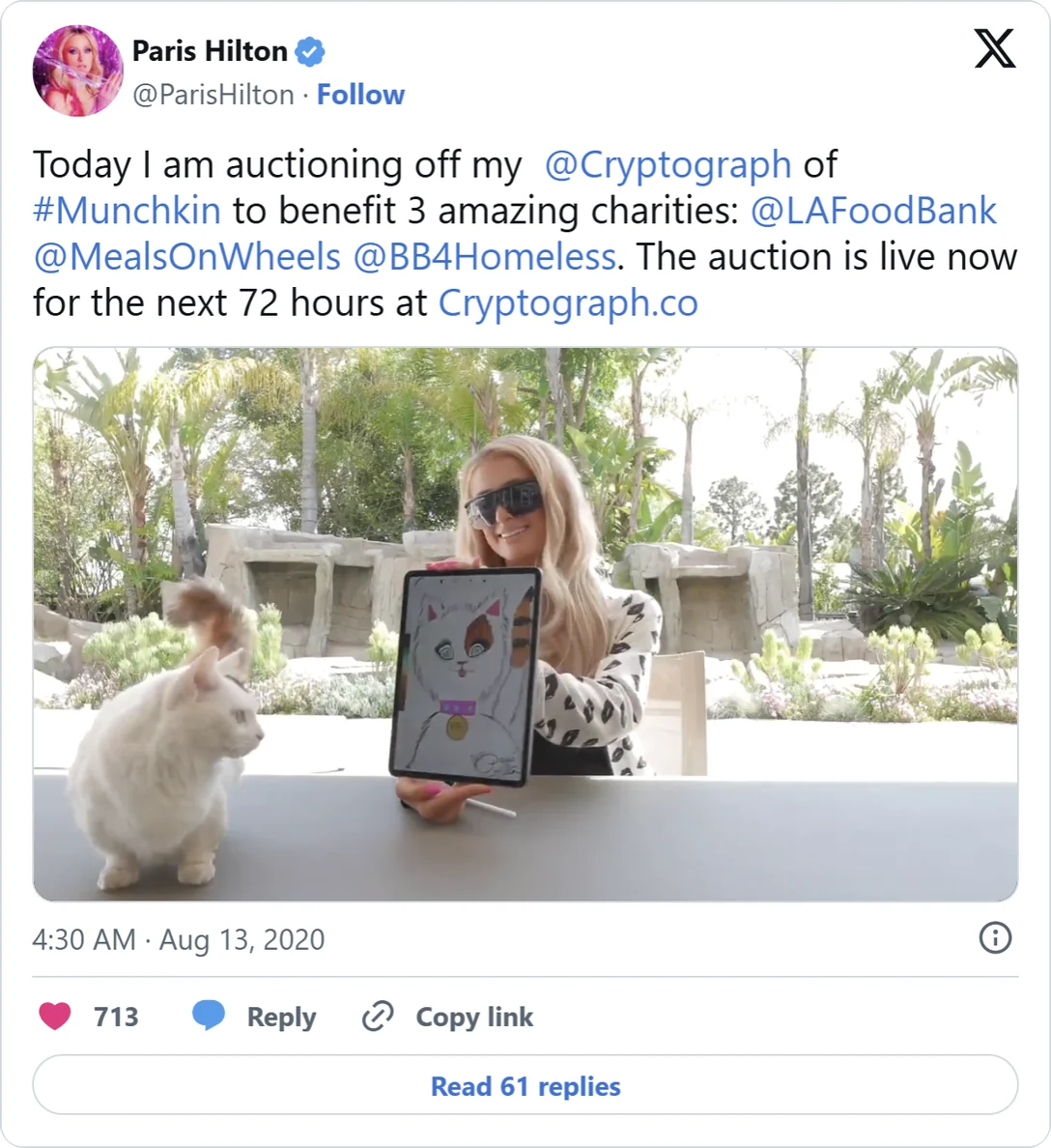 Paris Hilton on X: “Today I am auctioning off my @Cryptograph of #Munchkin to benefit 3 amazing charities: @LAFoodBank @MealsOnWheels @BB4Homeless. The auction is live now for the next 72 hours at Cryptograph.co”, posted 13 August 2020, with a photograph of her holding a tablet showing the drawing beside her cat.