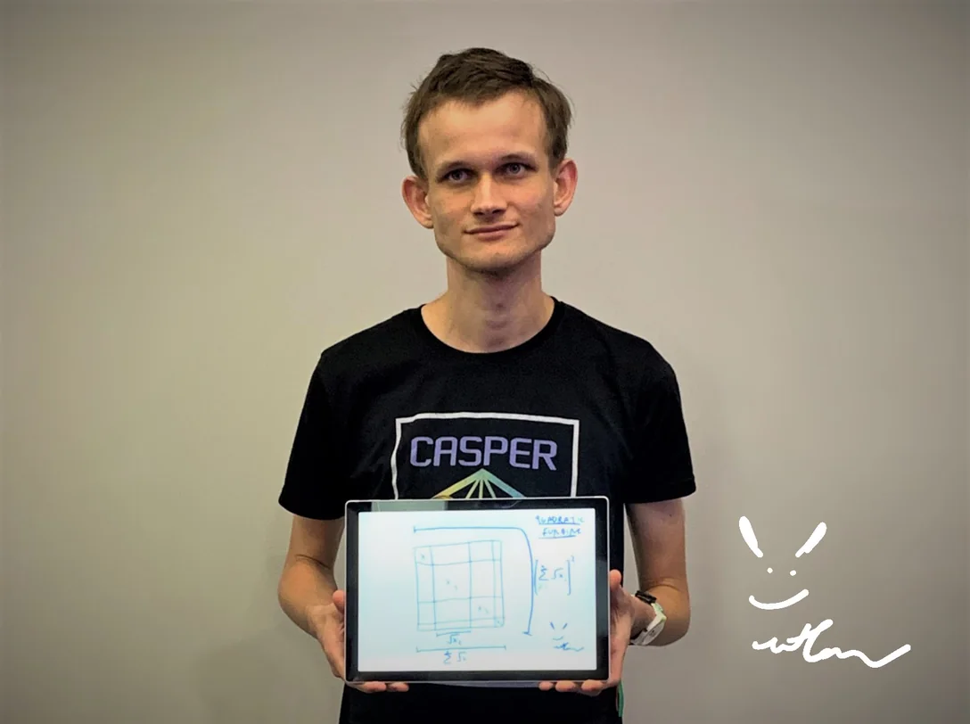 Vitalik Buterin holding a tablet displaying his cryptograph, a hand-drawn diagram titled “Quadratic Funding” with a smiley face and his signature beside it.
